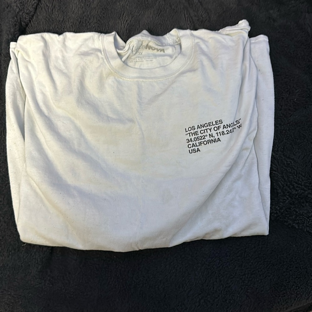 White t with black designs